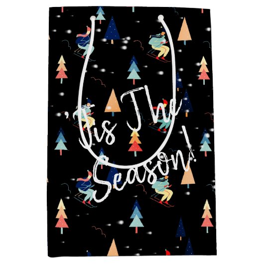 ブラックミディアムギフトの雪片のクリスマススキーヤー ミディアムペーパーバッグ (正面)