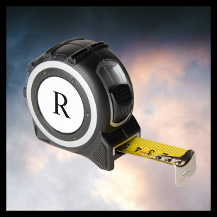 ブラックモノグラム上の白い手作りギフトツール メジャー