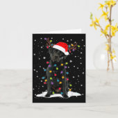 ブラックラブラドールクリスマスツリーライトパジャマ犬 カード (黄色い花)