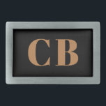 ブラック金ゴールドモノグラムイニシャルエレガントモダン 長方形ベルトバックル<br><div class="desc">黒い背景、黄金の文字。モノグラムのイニシャルをカスタマイズして追加。</div>