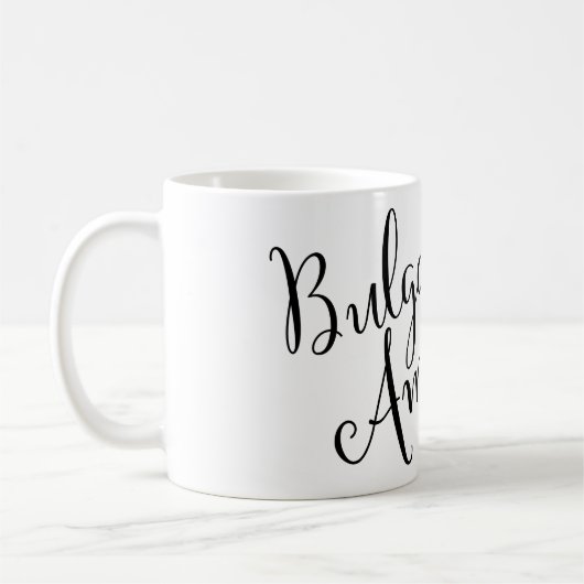 ブルガリア系アメリカ人の絡み合ったハートマグ コーヒーマグカップ (左)