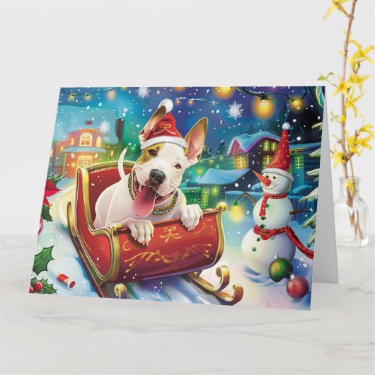 ブルテリアの犬のそり 雪 クリスマス カード (黄色い花)