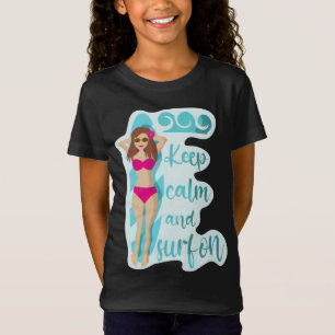 ブルネ保ットの女の子のTシャツで穏やかでサーフ Tシャツ