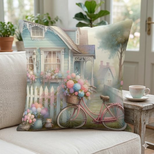 ブルーのコテージの門にあるピンクの花の自転車 クッション