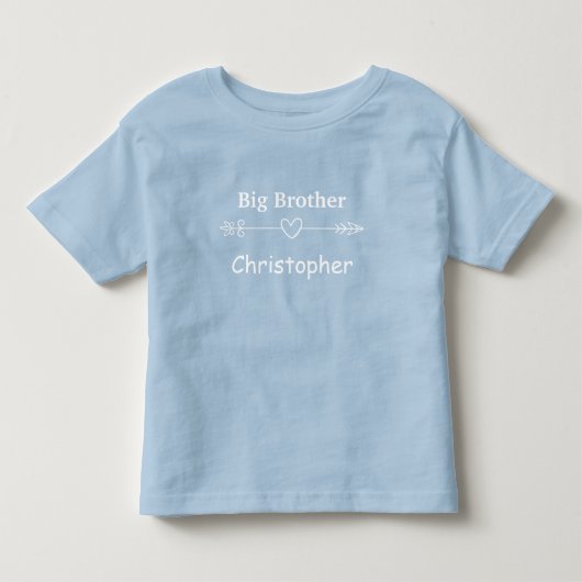 ブルーの大きな矢印のハートのボホ調の個性的なデザイン トドラーTシャツ (正面)