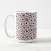 ブルーの背景にピンクの花 コーヒーマグカップ (左)