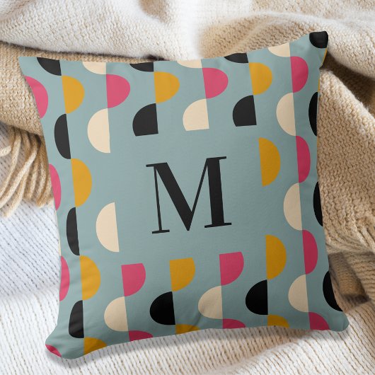 ブルーイエローピンクの円のパターンのレトロ クッション