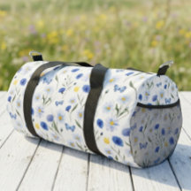 ブルーウォーターカラーの野の花の草原の蝶