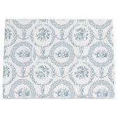 ブルーエレガント刻印フローラメダリオンとスワッグ ラージペーパーバッグ (正面)