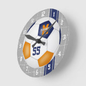 ブルーオレンジチームカラーズバストライプッサー ラウンド壁時計 (傾斜)