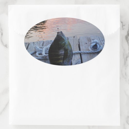 ブルーギルアットサンセットレイクの矢印 楕円形シール (バッグ)