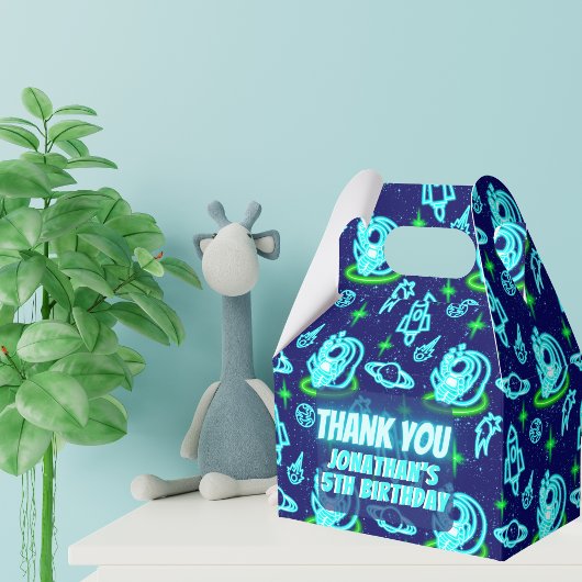 ブルーグリーンネオン白熱［赤熱］光を放つ宇宙ロケット フェイバーボックス