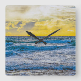 ブルーシーに沈む黄色い夕日 スクエア壁時計