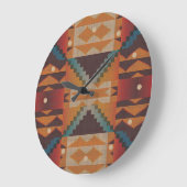 ブルーティール(緑がかった色)ダークブラウンベージュオレンジレッドトライバルアート ラージ壁時計 (傾斜)