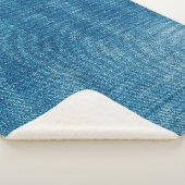 ブルーデニムのジーンズの生地が閉じる。ブルーデニムジャン シェルパブランケット (3/4)