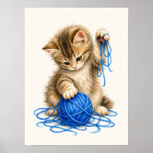 ブルーヨーンで遊ぶかわいいトラ柄の子猫