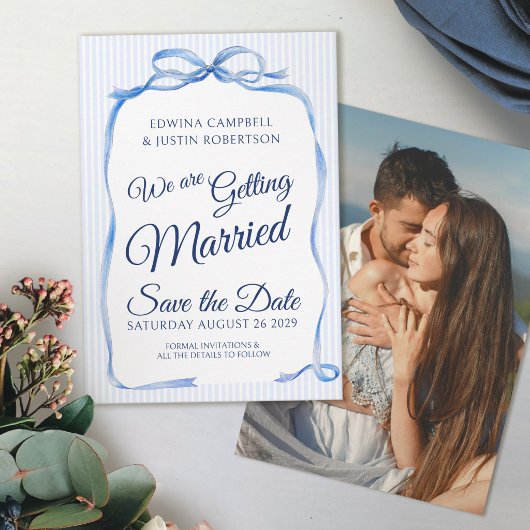 ブルーリボンアートストライプの結婚式延期案内カード セーブザデート