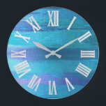 ブルー海ストロークスビーチハウスローマンナンバーズ ラージ壁時計<br><div class="desc">ユニークおよび装飾ホームデコミニマルーの実際のファッション傾向に対応します。
手の形と色を変更できます。
フローレンスKデザイン</div>