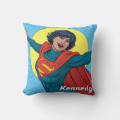 ブルー飛んでいるスーツのスーパーガール クッション (正面)