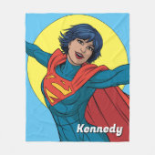 ブルー飛んでいるスーツのスーパーガール フリースブランケット (正面)