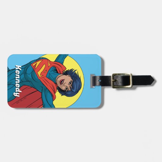 ブルー飛んでいるスーツのスーパーガール ラゲッジタグ (正面横)