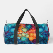 ブルー鮮やかオレンジピンクアルコールインク（ばちゃばちゃ）跳ねる ダッフルバッグ (裏面)