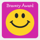 ブレイブアワードのイエロー顔オンピンク スクエアシール (正面)