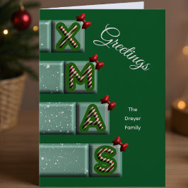 ブロックにクリスマスの文字 キャンディケーンと家族のあいさつ シーズンカード