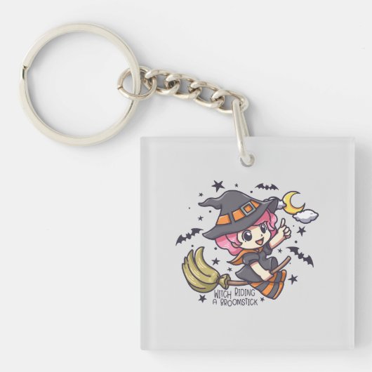 ブロムスティックに乗ったかわいい魔女 キーホルダー (正面)
