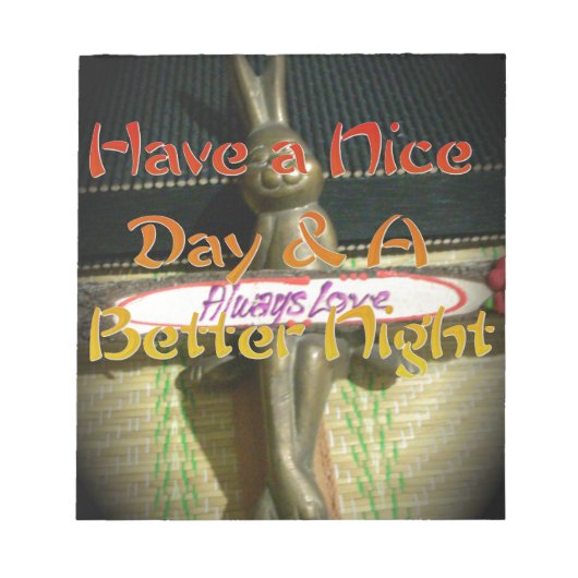 ブロンズのウサギの彫刻(引用文付感動的) ノートパッド (正面)