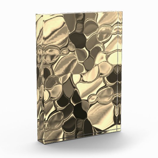 ブロンズ色の丸みを帯びた形状、光沢のある光金ゴールド フォトブロック (左)