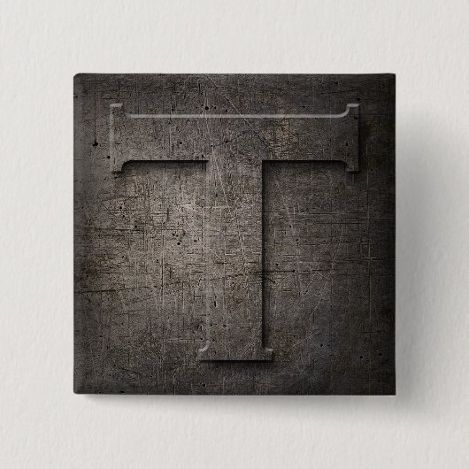 ブロンズ黒金属Tモノグラム正方形ボタン 缶バッジ (正面)