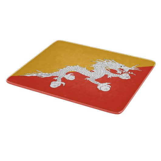 ブータン国旗を掲げた小さなガラス板 カッティングボード (角)