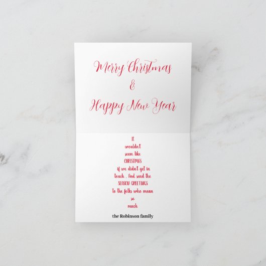 プレゼントが乗った赤いクリスマスカー　その上には木が カード (内部)