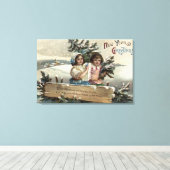 プレゼントと木を持つ小さな女の子 キャンバスプリント (インサイチュ (ウッドフロア))