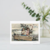 プレゼントと木を持つ小さな女の子 ポストカード (スタンド正面)