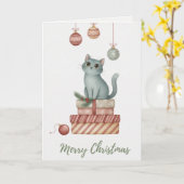プレゼントの箱の上のクリスマスの子猫 カード (黄色い花)