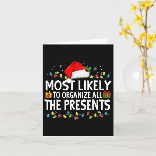 プレゼントを全て整理する家族のクリスマス カード (黄色い花)