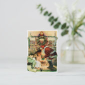 プレゼントを提供しているサンタクロース 名刺 (スタンド正面)