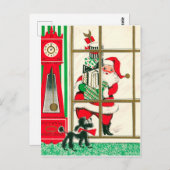 プレゼント付きサンタクロースが窓を見ている ポストカード (正面/裏面)