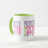 プロモートビッグシスター – Big Sister Reveal マグカップ (正面左)