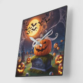 ヘッドストーンに乗ったハロウィーンのカボチャ スクエア壁時計 (傾斜)