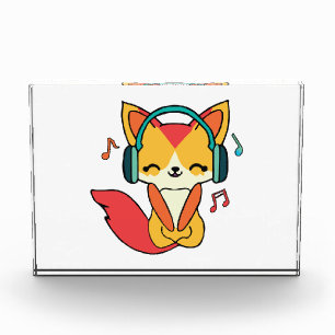 ヘッドフォンと幸せ聞なフォックス音楽。 フォトブロック