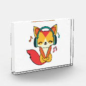 ヘッドフォンと幸せ聞なフォックス音楽。 フォトブロック (左)