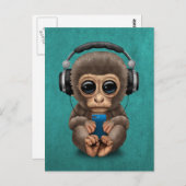 ヘッドホン装着ベビー付き携帯電話付き可愛い携帯電話猿 ポストカード (正面/裏面)