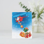 ヘリコプターから贈り物を投げるサンタクロースおもしろい シーズンポストカード (スタンド正面)