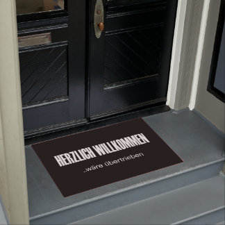 ヘルツリッヒウィルコメンウェアユベルトリエベン ドアマット