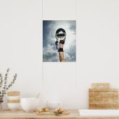 ヘルメットを空中に保持しているサッカー選手 ポスター (キッチン)