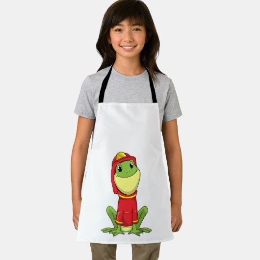 ヘルメットを装着した消防士としてのカエル エプロン (インサイチュ)