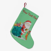 ベッドにプレッシーを入れたかわいいサンタの写真 スモールクリスマスストッキング (正面 (吊り時))